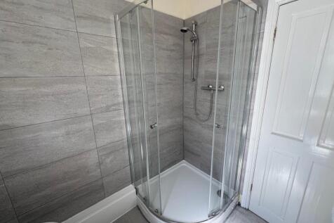 A modern and clean bathroom featuring a stylish...