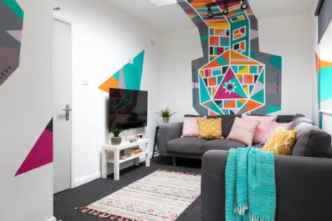 A modern, vibrant living room featuring colorfu...