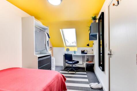 Bright and inviting double bedroom featuring a ...