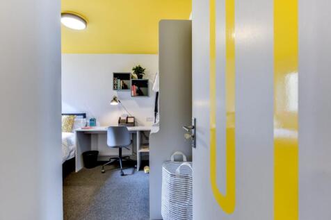 Bright, modern single bedroom with a study area...