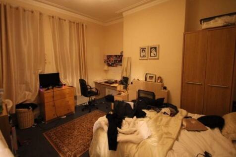 Cozy master bedroom featuring a double bed, amp...