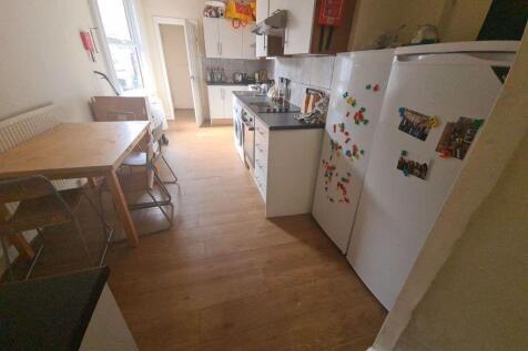 Bright and functional kitchen space featuring a...