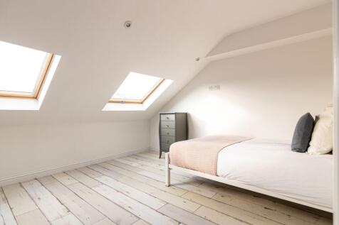 Bright converted attic double bedroom with two ...