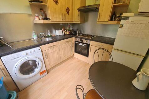 Well-equipped kitchen with fitted cabinets, int...
