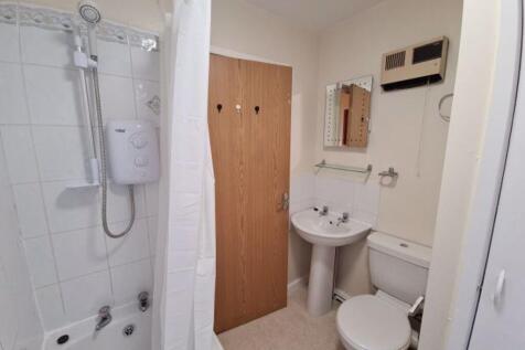 Clean, well-maintained bathroom with a shower-b...