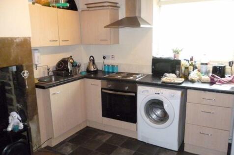 Bright kitchen with modern cabinets, integrated...
