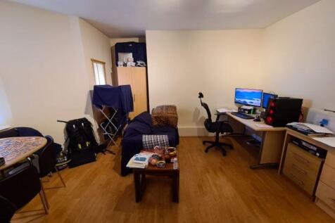 Bright, tidy living area with wooden flooring, ...