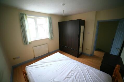 This charming double bedroom features ample nat...
