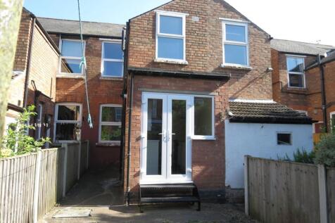 Bright and well-maintained rear view of a tradi...