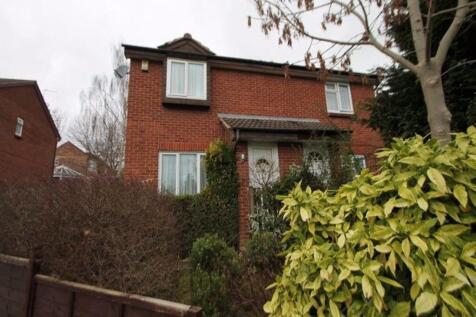 Brick-front semi-detached house with bay window...