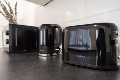 Well-presented kitchen countertop with matching...