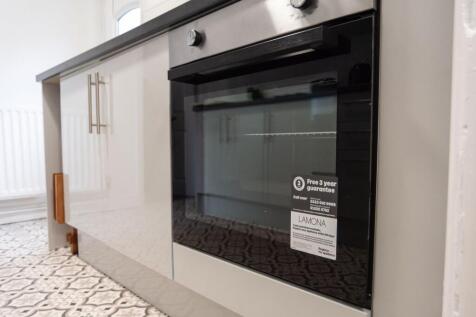 Modern kitchen detail showing a built-in electr...