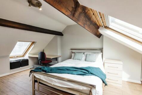 Bright and inviting double bedroom with a moder...