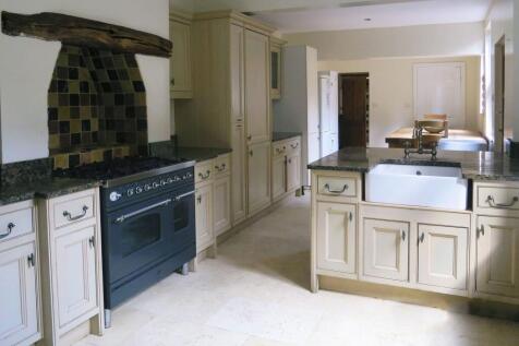 A spacious kitchen featuring traditional-style ...