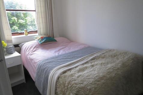 Bright and inviting double bedroom featuring a ...