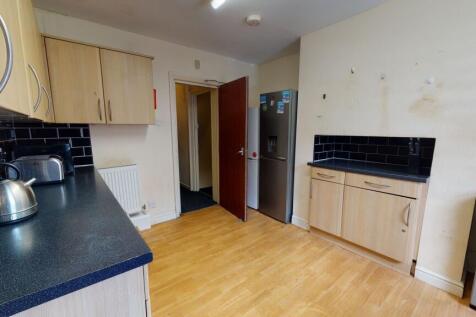 Bright and functional kitchen featuring wooden ...