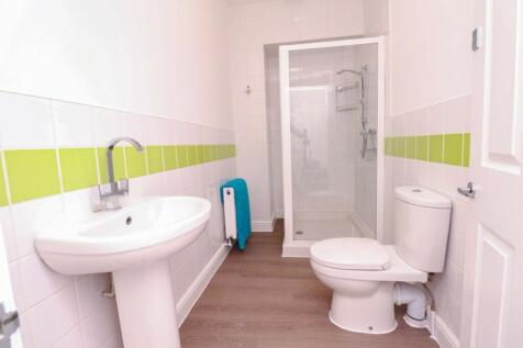 A bright and clean bathroom featuring a modern ...