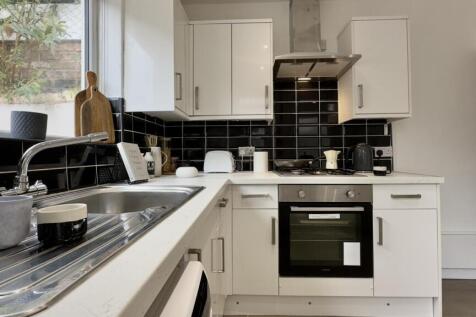 A bright and modern kitchenette, perfect for st...