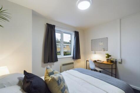 A spacious and bright large double bedroom with...
