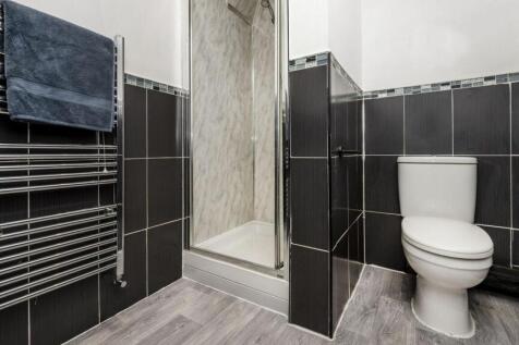 A modern and well-maintained bathroom featuring...