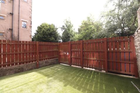 A well-maintained garden space, perfect for rel...