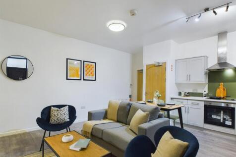 A stylish and spacious modern living room perfe...