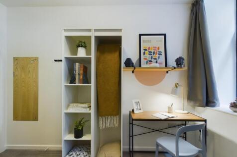 A stylish and well-organized double bedroom fea...