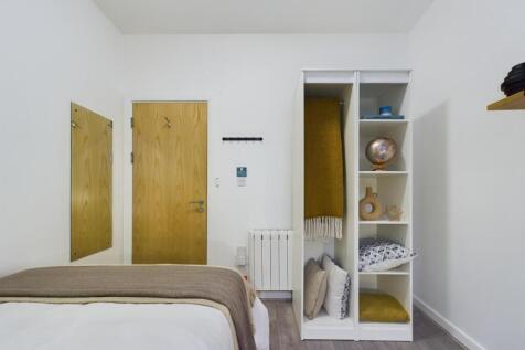 A stylish and inviting double bedroom, featurin...