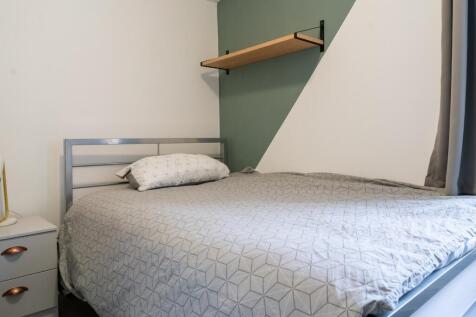 A modern and inviting double bedroom, perfect f...