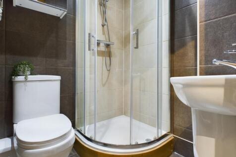 A modern and clean bathroom featuring a stylish...