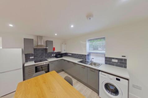 A modern and well-equipped kitchenette, perfect...