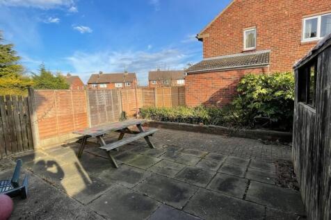A spacious and well-lit garden area perfect for...