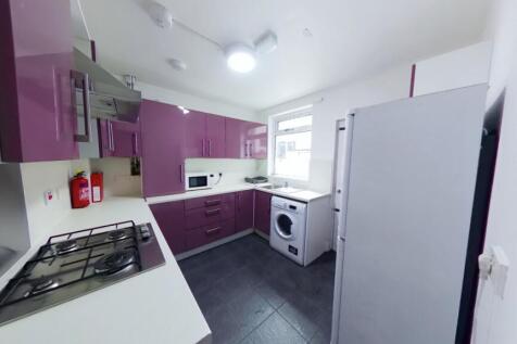 A modern and well-equipped kitchen featuring vi...