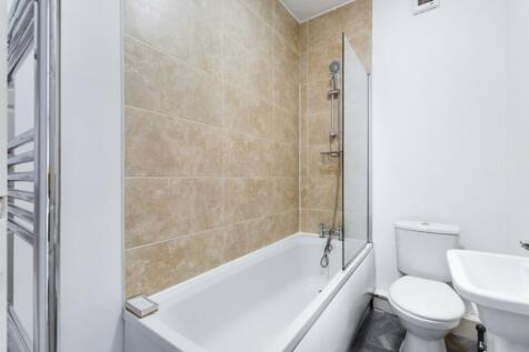 A modern and well-maintained bathroom featuring...