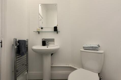 A modern and well-maintained bathroom featuring...