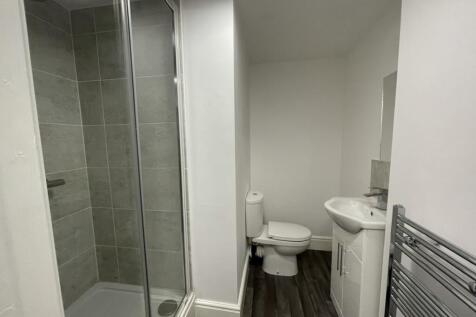 A modern and well-maintained bathroom featuring...