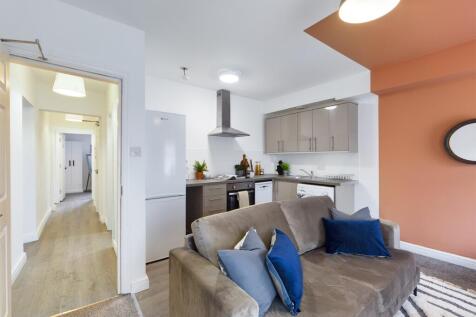 A spacious and inviting large modern living roo...