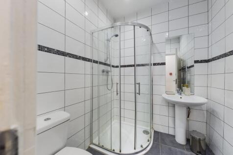 A modern and clean bathroom featuring a stylish...