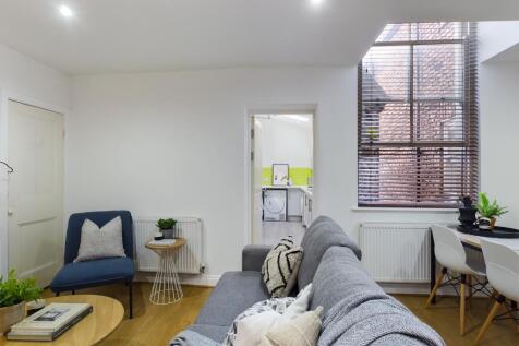 A stylish and inviting large modern living room...