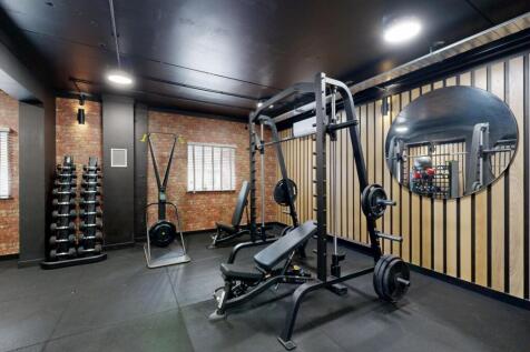 Well-equipped private gym with a multi-function...
