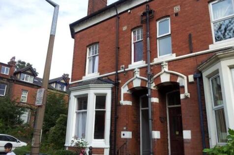 A charming red brick terraced house featuring c...