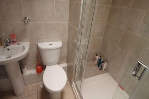 A neat and well-maintained bathroom featuring a...