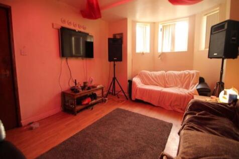 Cozy living room featuring comfortable seating,...