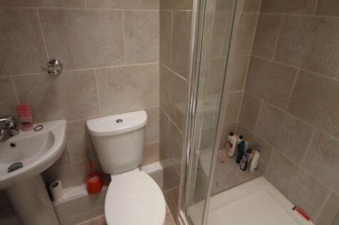 A clean and well-maintained bathroom featuring ...