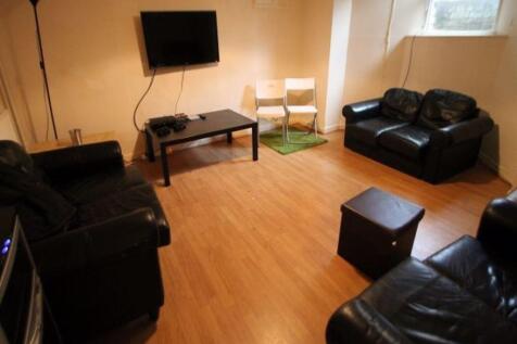 Bright and welcoming living room featuring comf...