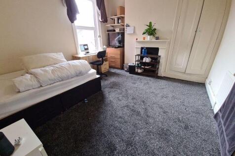 Bright and welcoming living room with natural l...