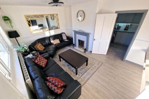 A stylish and inviting living room featuring a ...