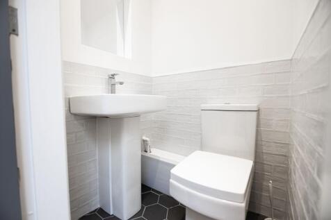 Bright, modern cloakroom with a contemporary pe...