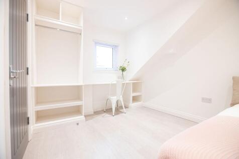 Bright, recently renovated bedroom with built-i...