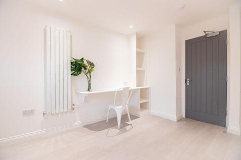 Bright, minimalist study corner with a built-in...